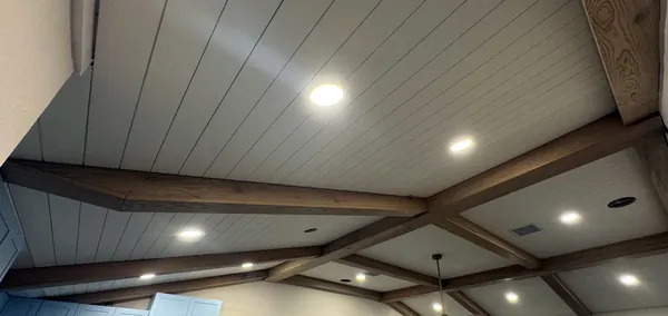 Vaulted shiplap ceiling with wood beams and recessed lights, Tampa Bay